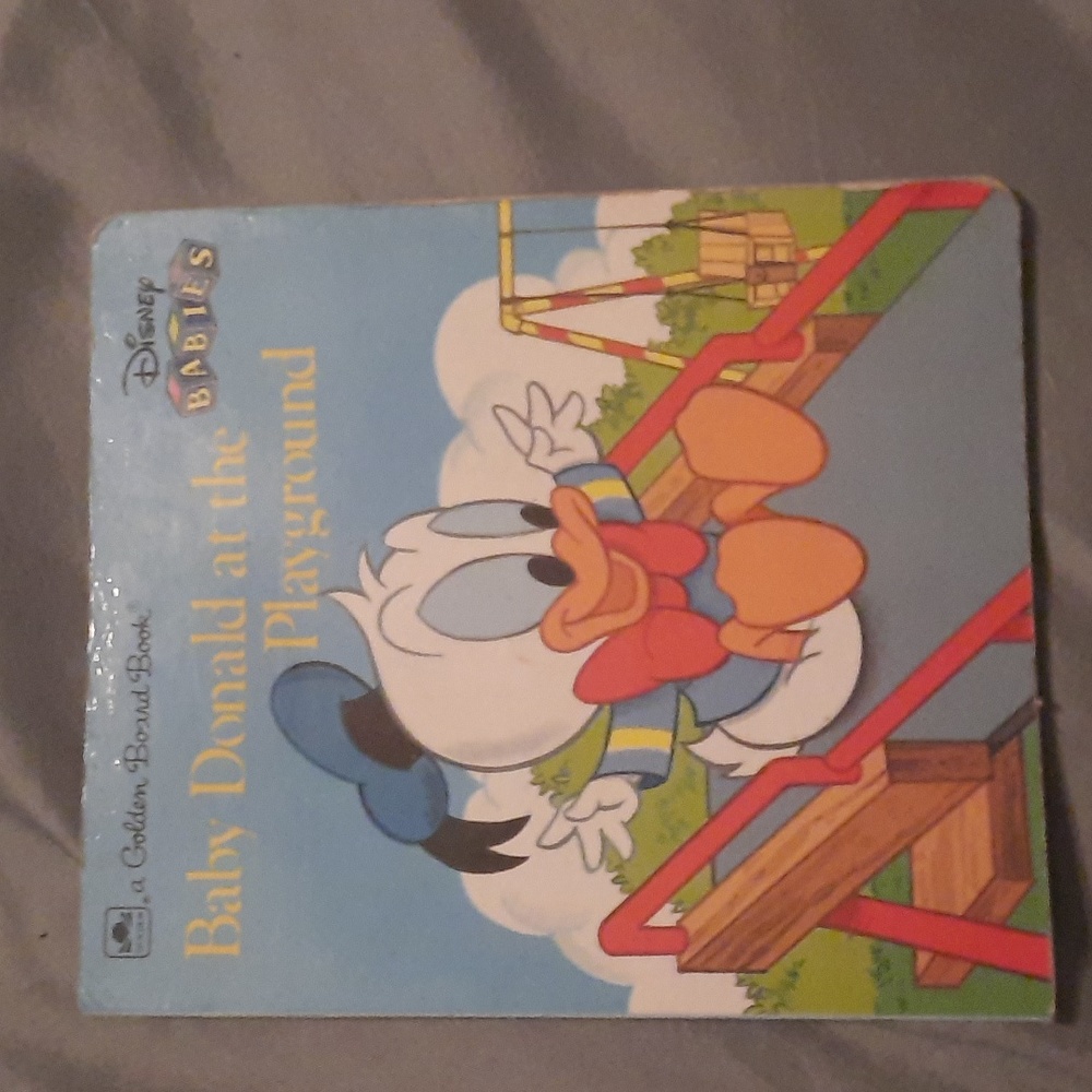 Baby Donald at the playground golden book